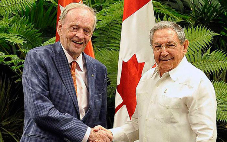 Raúl Castro y Jean Chrétien.
