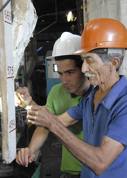 Yarobis y Orlando Delgado, padre e hijo.