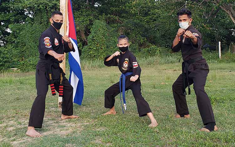 Yunier García Ortiz,  Flavio César Pedraza Cárdenas y Jordan Pacheco García, representantes del  Kenpo Gikan en Villa Clara.