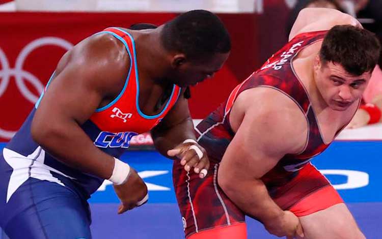 Combate entre el cubano Mijaín López y el turco Riza Kayaalp, 130 kg de la lucha grecorromana.